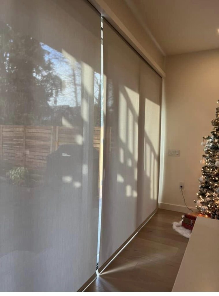Floor-to-ceiling roller blinds with holiday decor