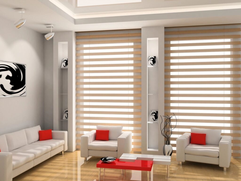 Bright living room with striped zebra blinds and red accent furniture